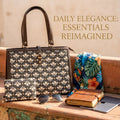 A close-up look at the modern, structured square tote bag (16" x 13") featuring a spacious main interior, a dedicated laptop section, and a secure zippered back pocket for effortless daily organization.