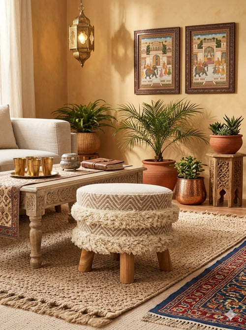 Handcrafted boho woven pouf ottoman used as a floor seating cushion in a living room by Anhad Rang